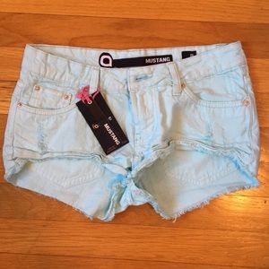 Distressed sky blue jean shorts